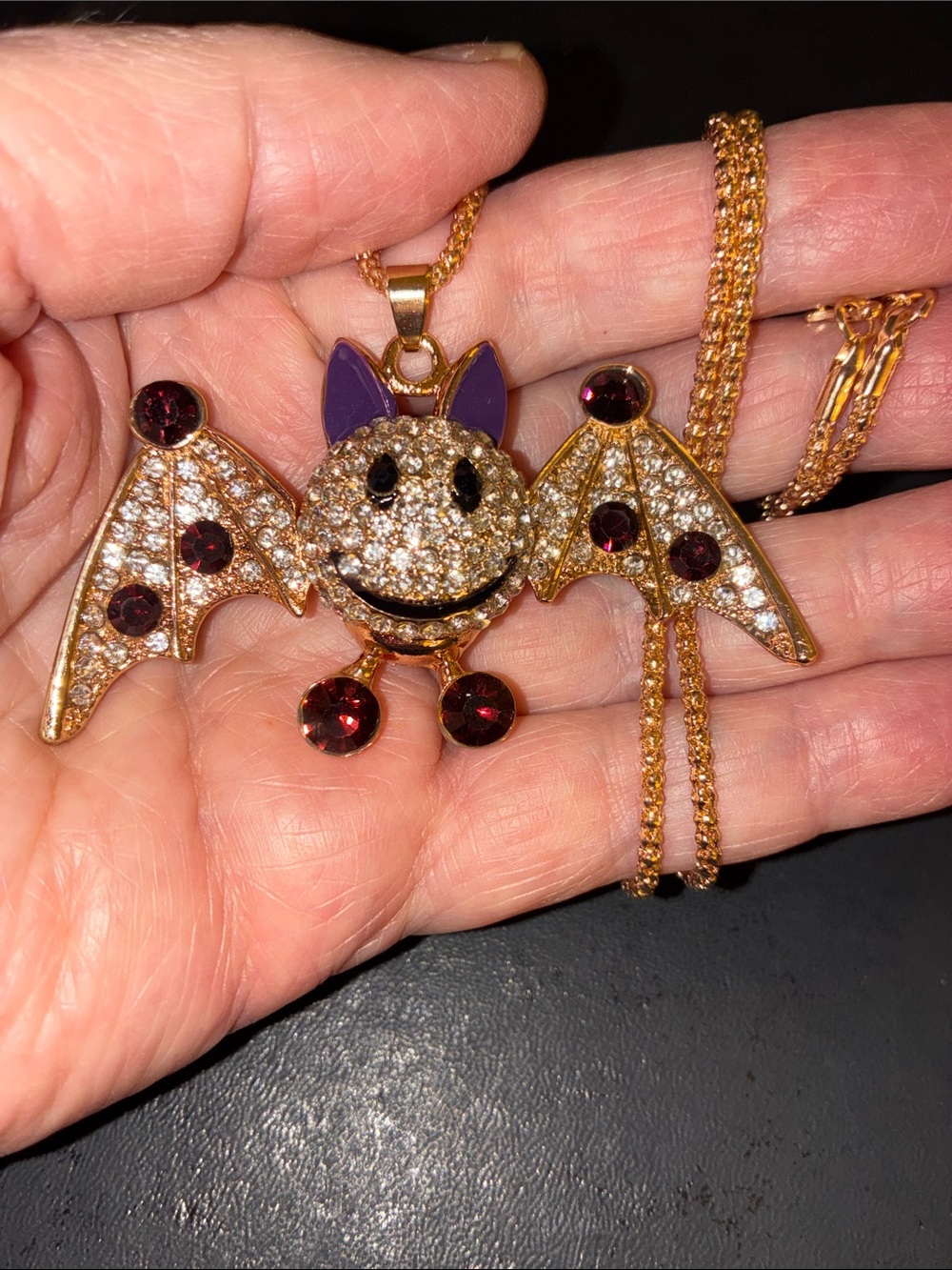 Bat Pendant Necklace with Purple Accents and Red Stones. The Wings Move.